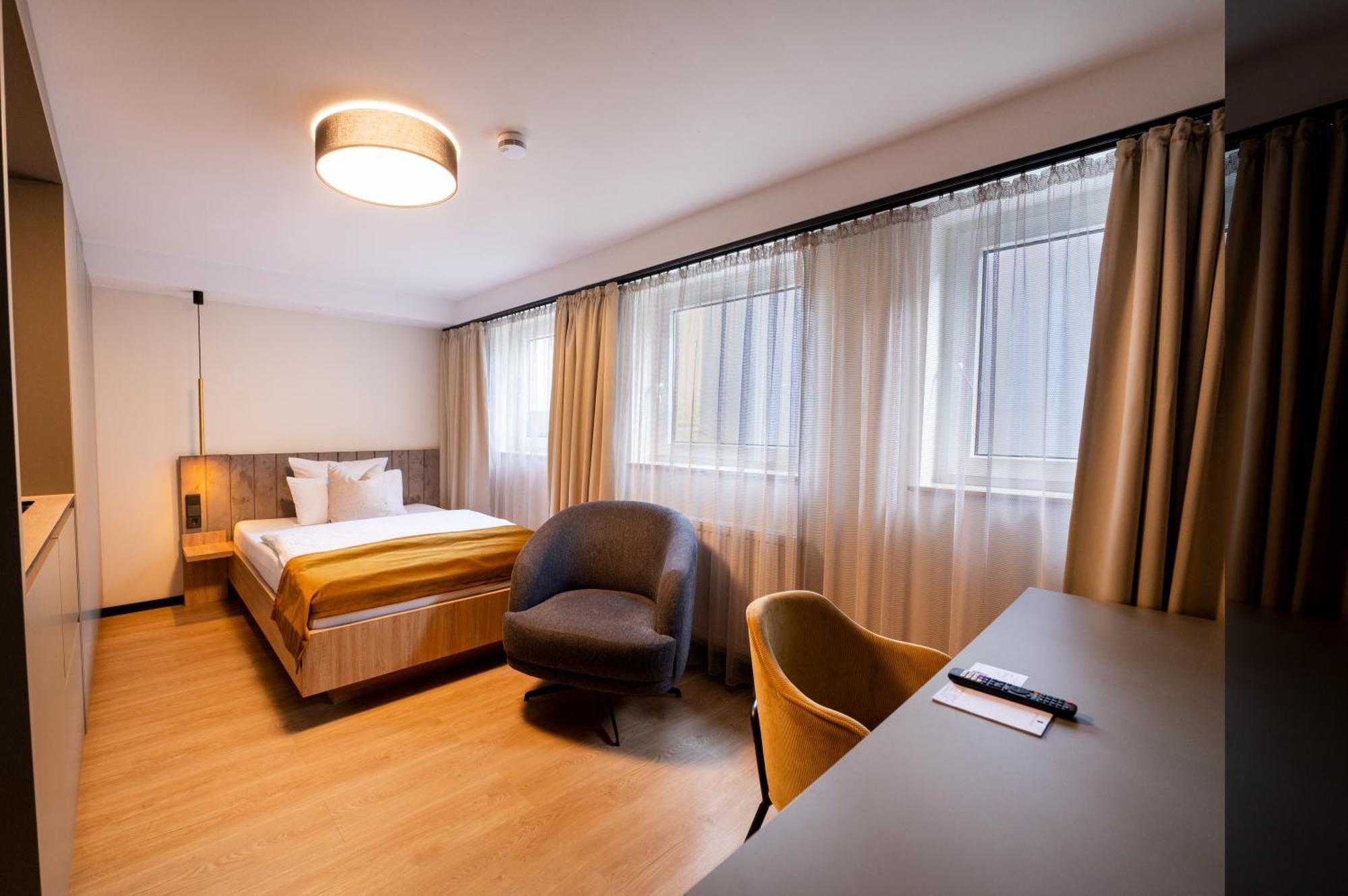 V Business Apartments เบิบลิงเงน ภายนอก รูปภาพ
