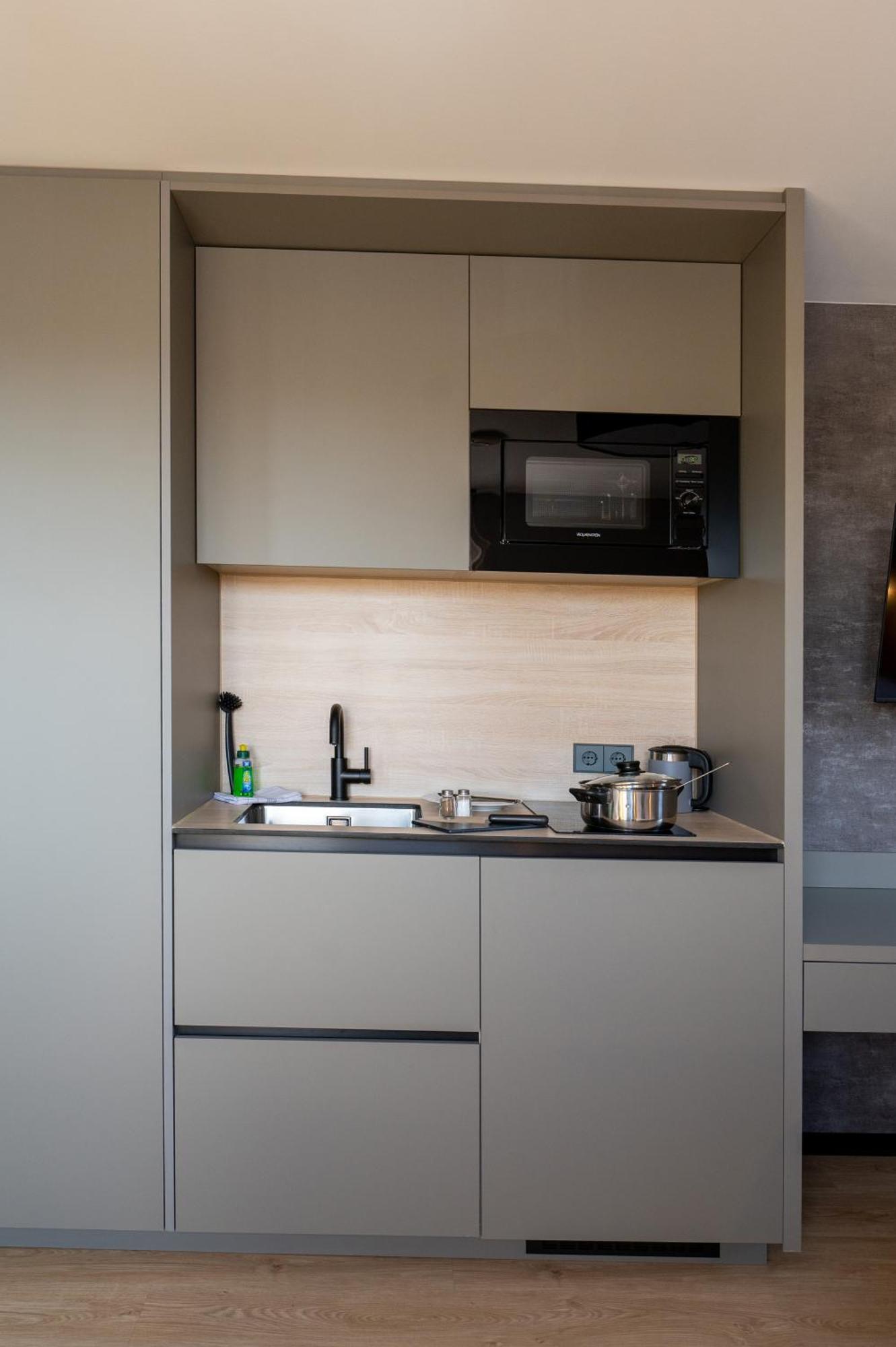 V Business Apartments เบิบลิงเงน ภายนอก รูปภาพ