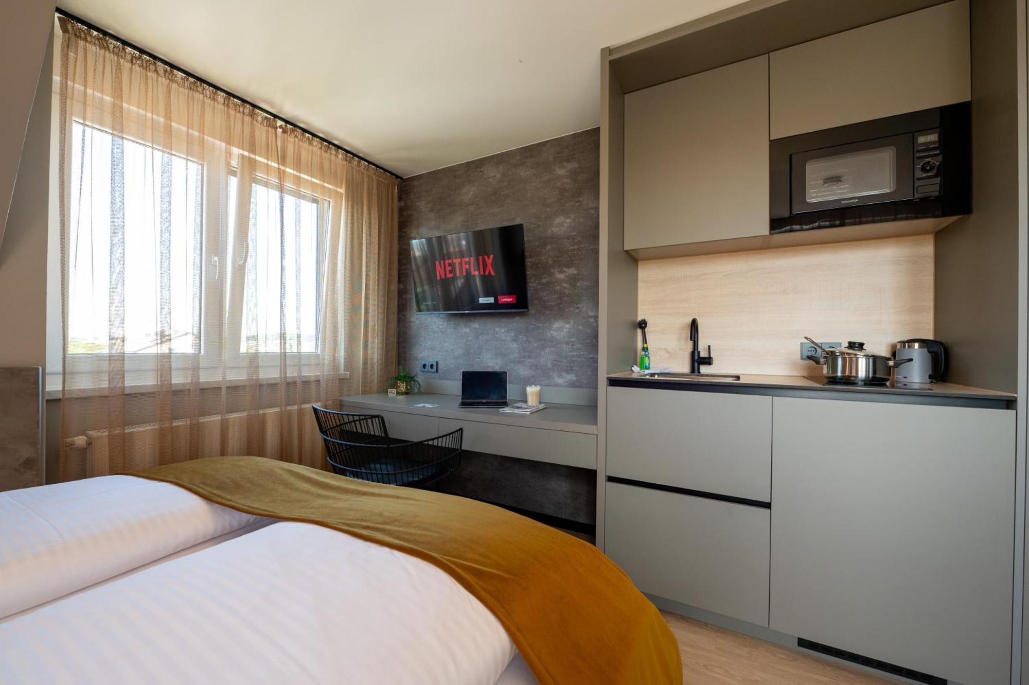 V Business Apartments เบิบลิงเงน ภายนอก รูปภาพ