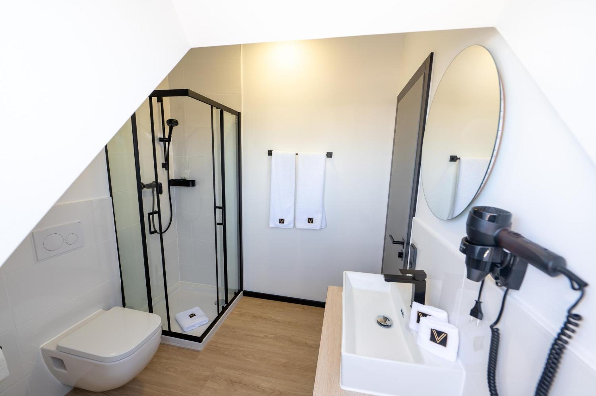 V Business Apartments เบิบลิงเงน ภายนอก รูปภาพ